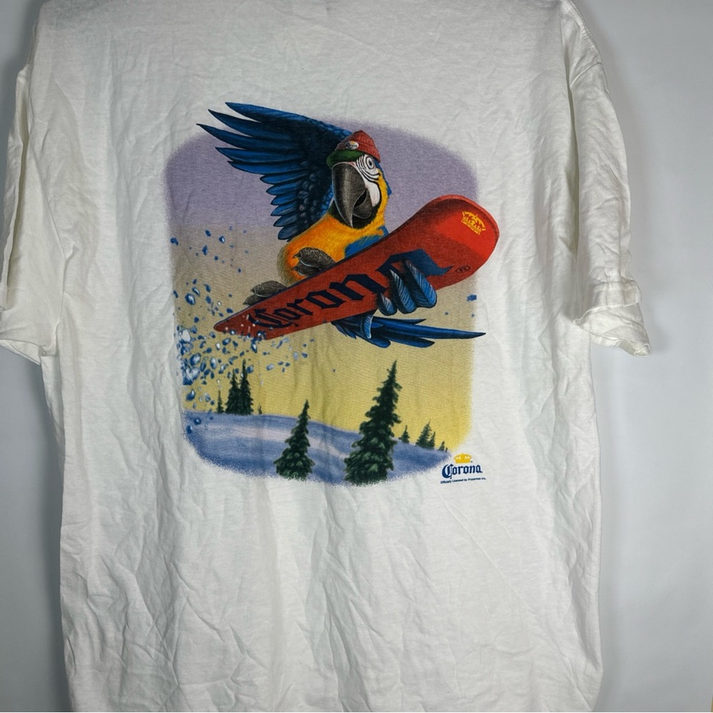 Corona White Tee with Snowboarding Parrot Design